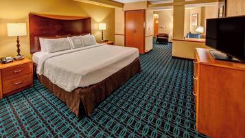 Premium bedding, desk, laptop workspace, iron/ironing board