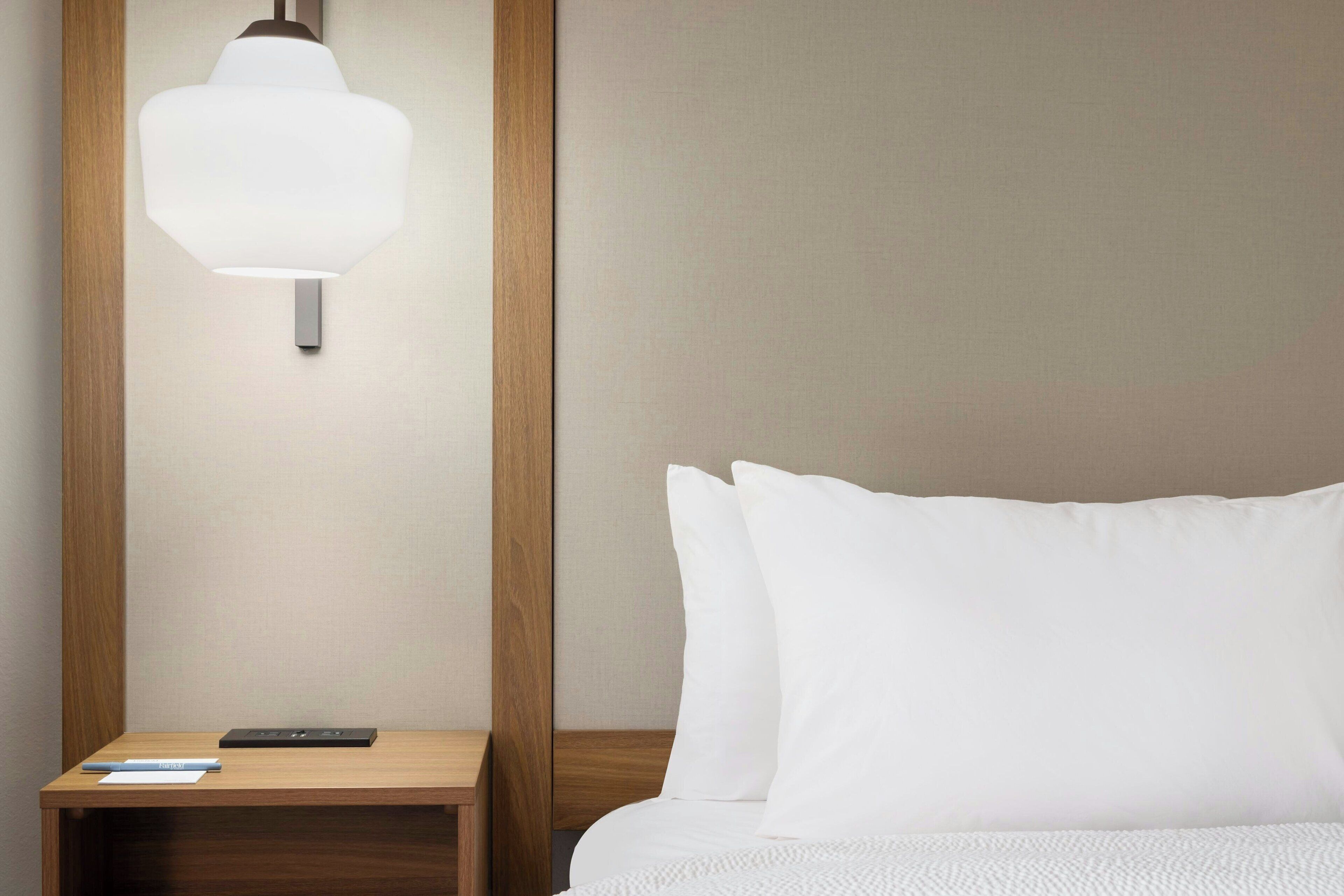 Premium bedding, desk, laptop workspace, iron/ironing board