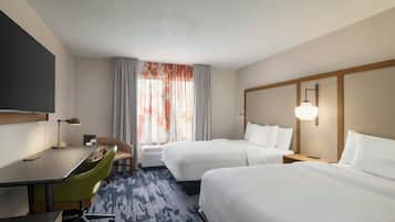 Rúmföt af bestu gerð, skrifborð, vinnuaðstaða fyrir fartölvur