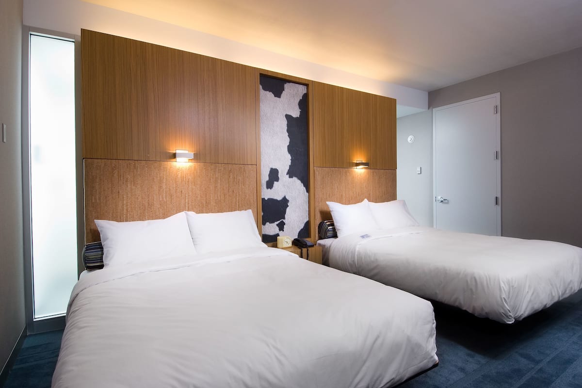 premium bedding, desk, blackout curtains, iron/ironing board