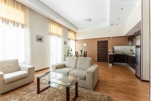 Standard Apartment, 1 Bedroom | Living area | Flat-screen TV