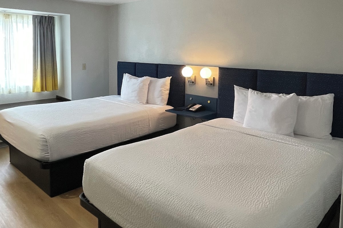 Standard Room, 2 Queen Beds | Desk, iron/ironing board, free WiFi, bed sheets
