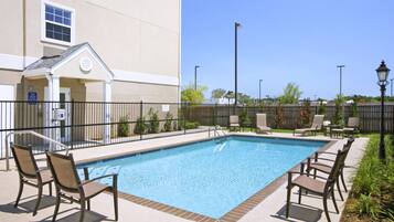 Seasonal outdoor pool, open noon to 8:00 PM, sun loungers