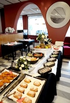 Breakfast, lunch, dinner served; al fresco dining 