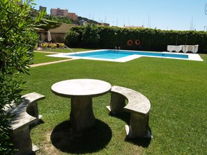 2 outdoor pools, open 8:00 AM to 8:00 PM, pool umbrellas, pool loungers