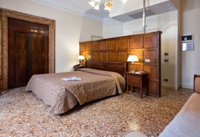 Hypo-allergenic bedding, minibar, in-room safe, desk