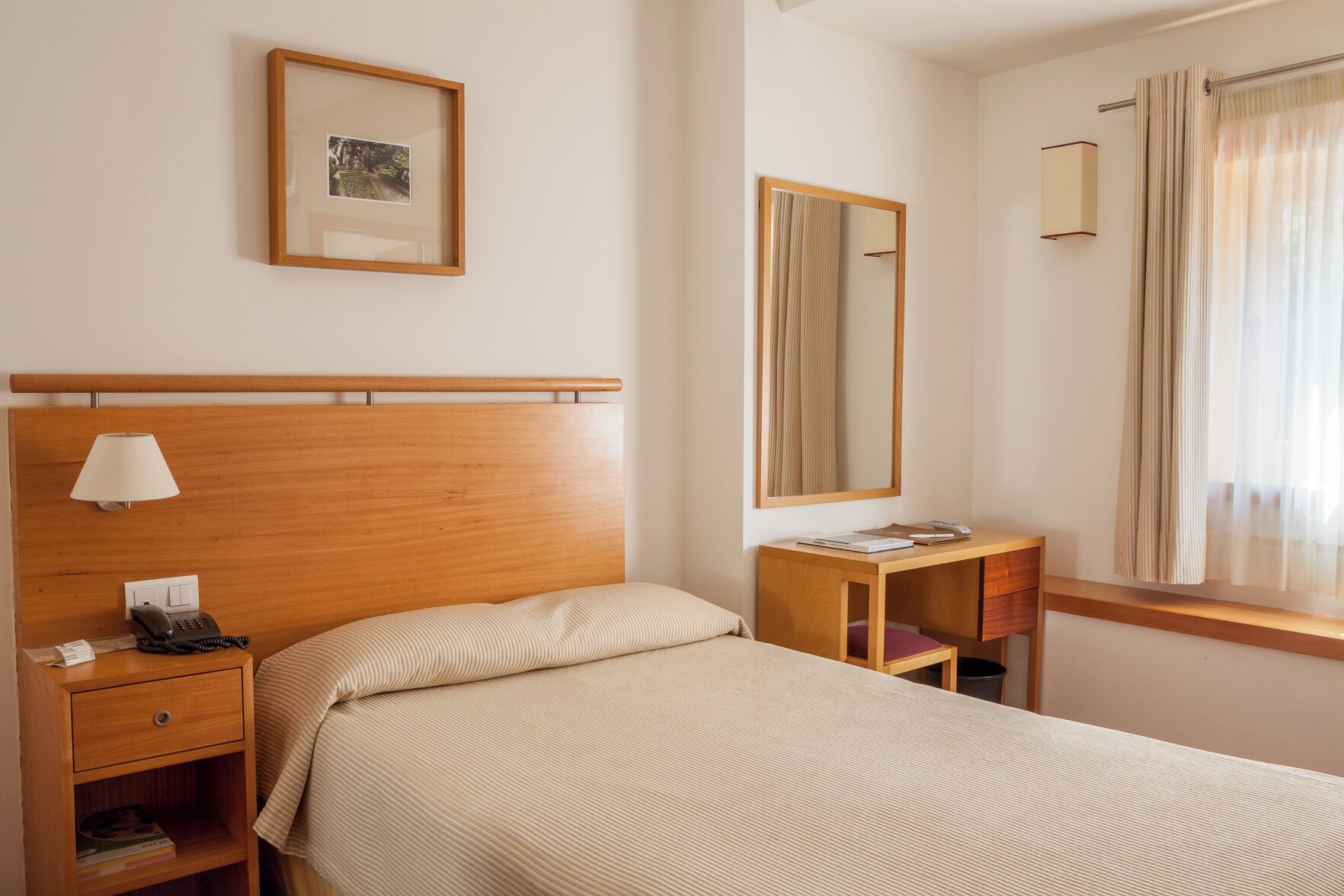 Desk, free WiFi, bed sheets