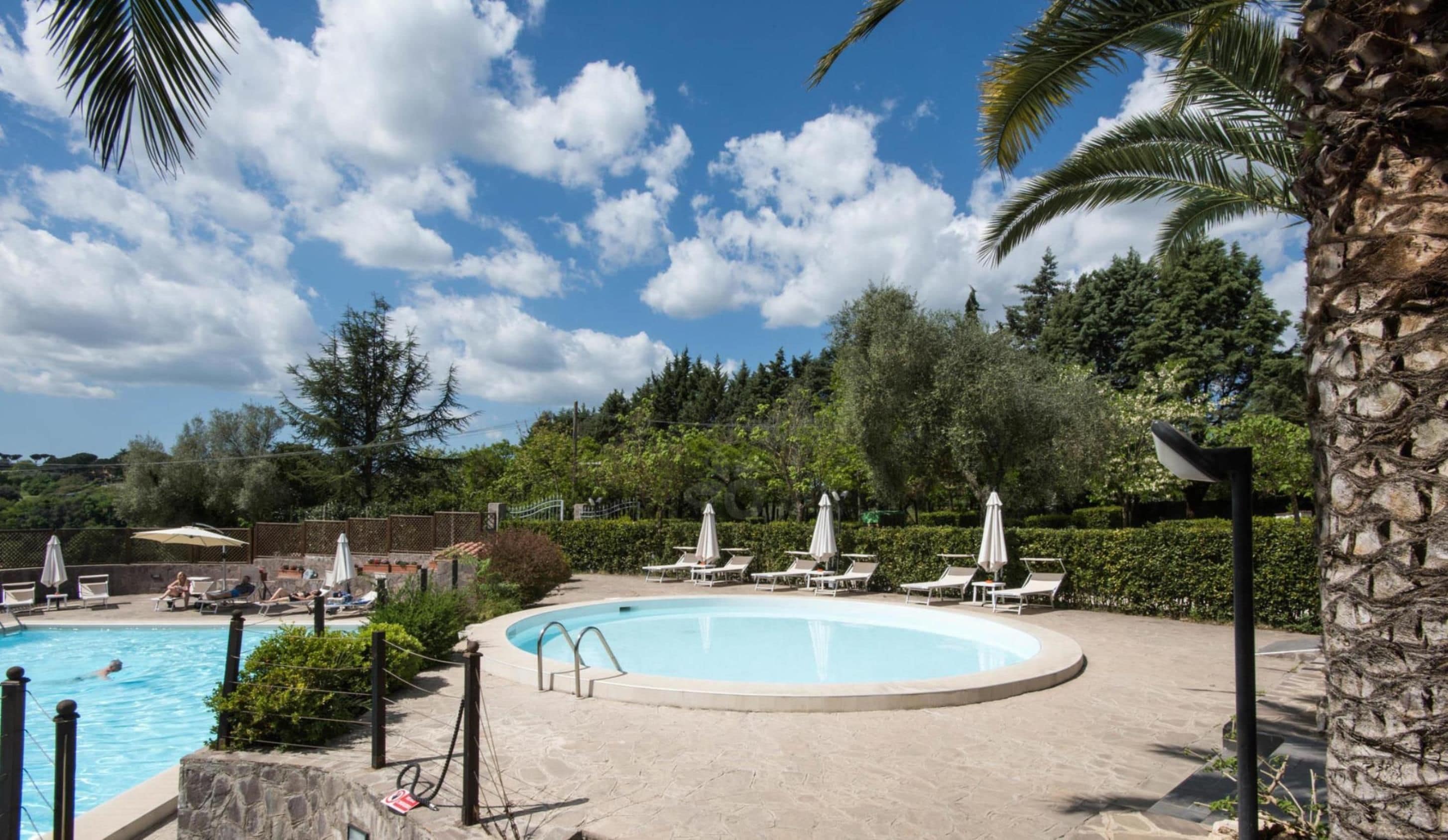 Seasonal outdoor pool, pool umbrellas, sun loungers