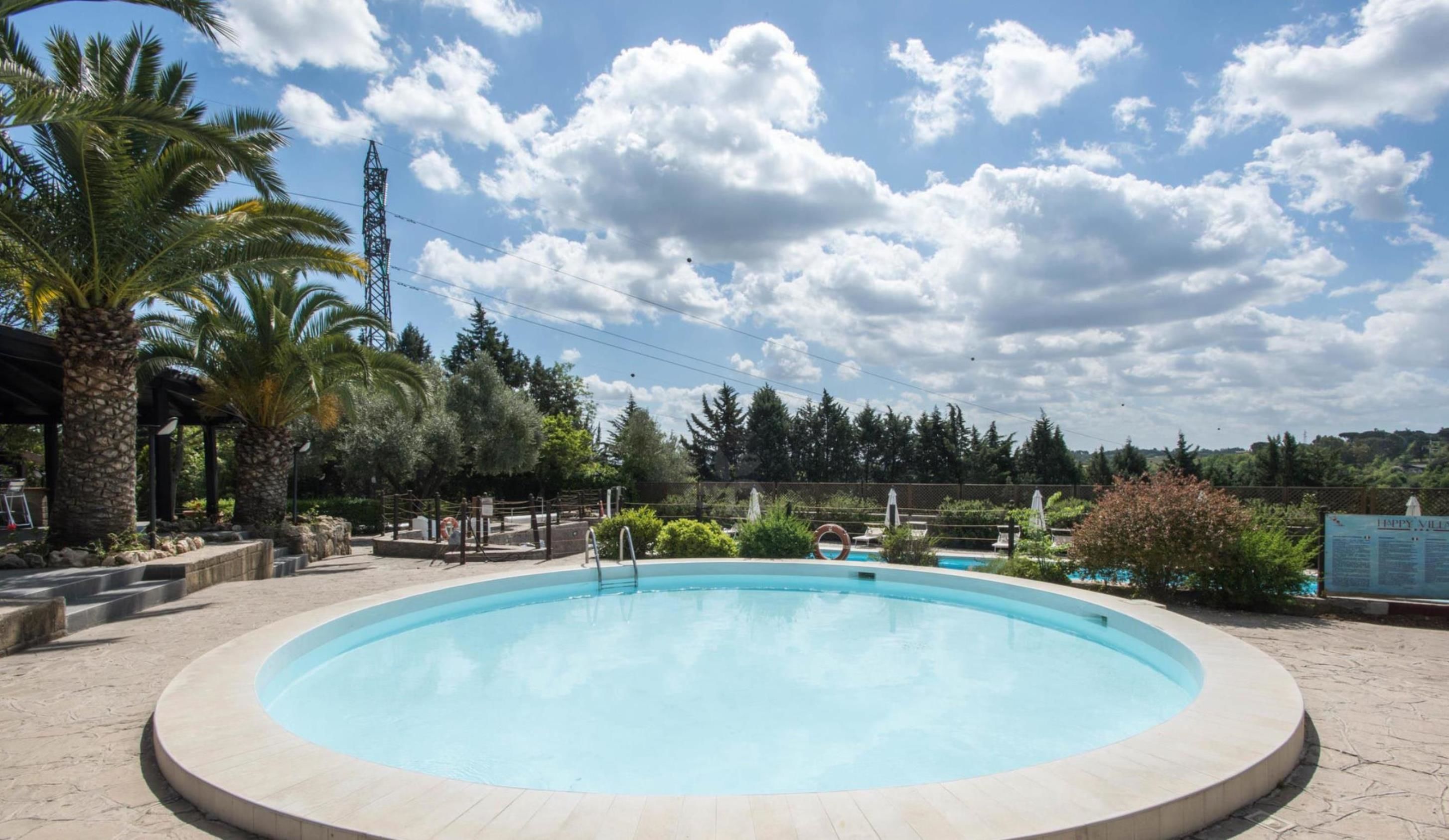 Seasonal outdoor pool, pool umbrellas, sun loungers