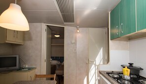 Bungalow supérieur, 2 chambres | Aire de séjour