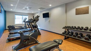 A fitness center with treadmills, a bench, and dumbbells. - Comfort Inn & Suites Montgomery Eastchase (Montgomery)