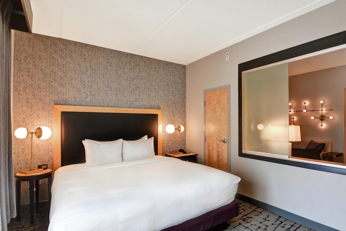 In-room safe, blackout drapes, WiFi (free), alarm clocks