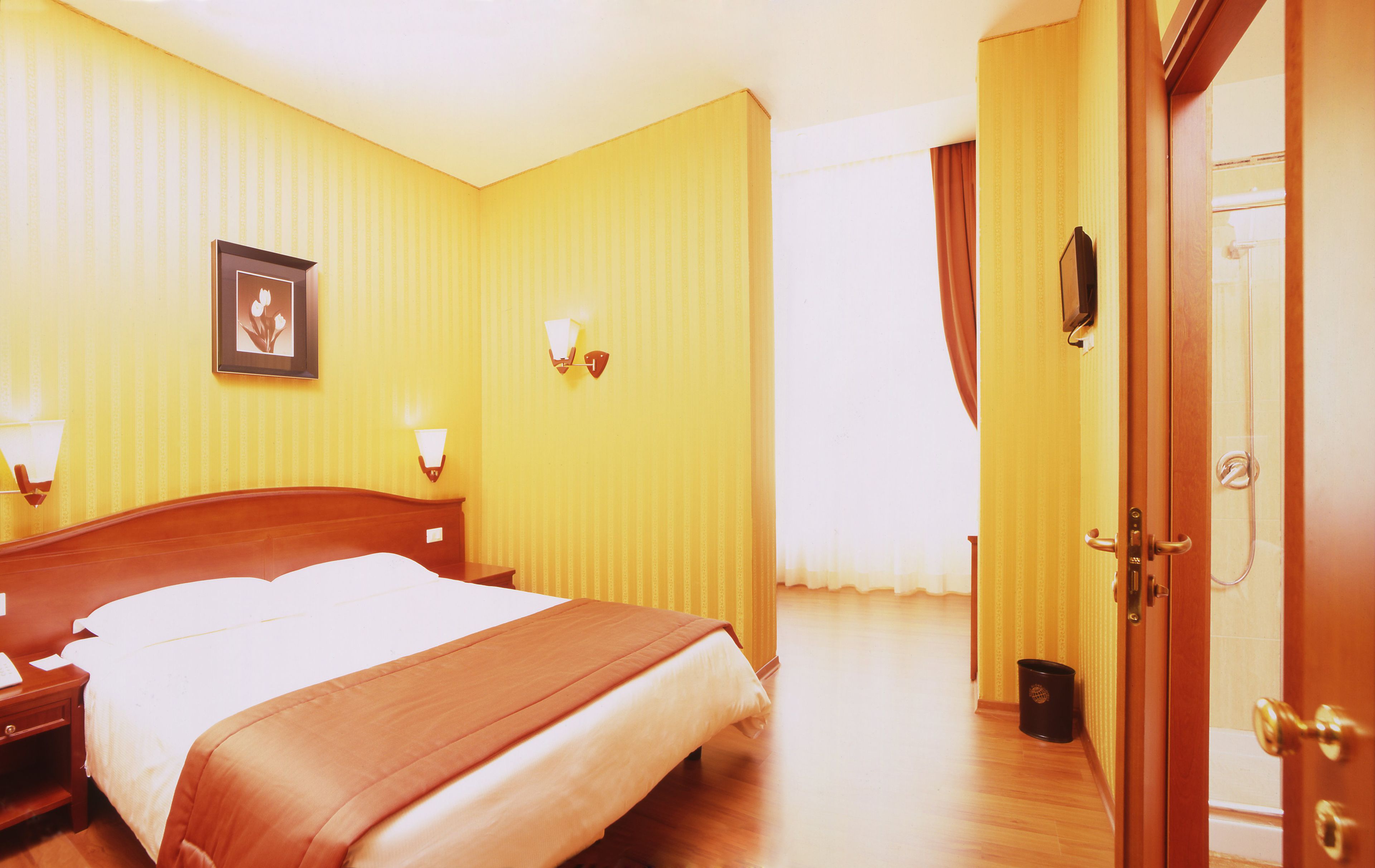 Camera tripla | Biancheria da letto di alta qualità, minibar, cassaforte in camera