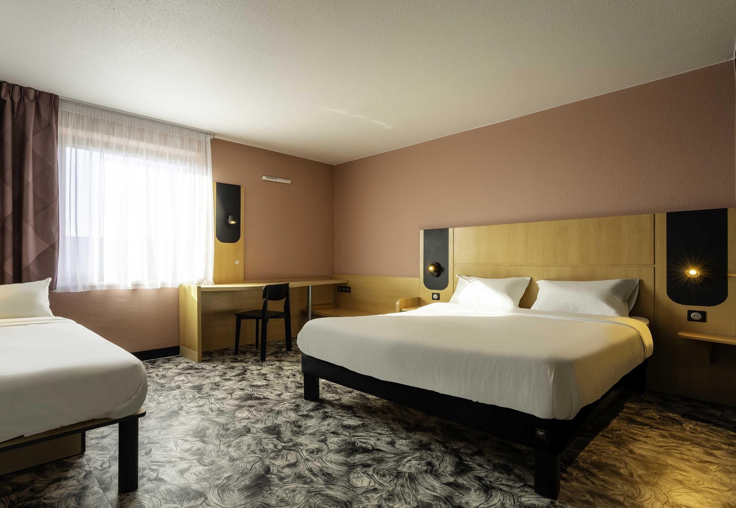 Standard Triple Room | Desk, blackout drapes, soundproofing, free WiFi