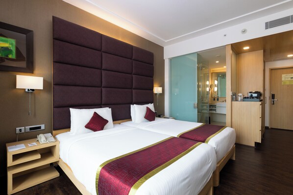 Down comforters, pillowtop beds, minibar, in-room safe