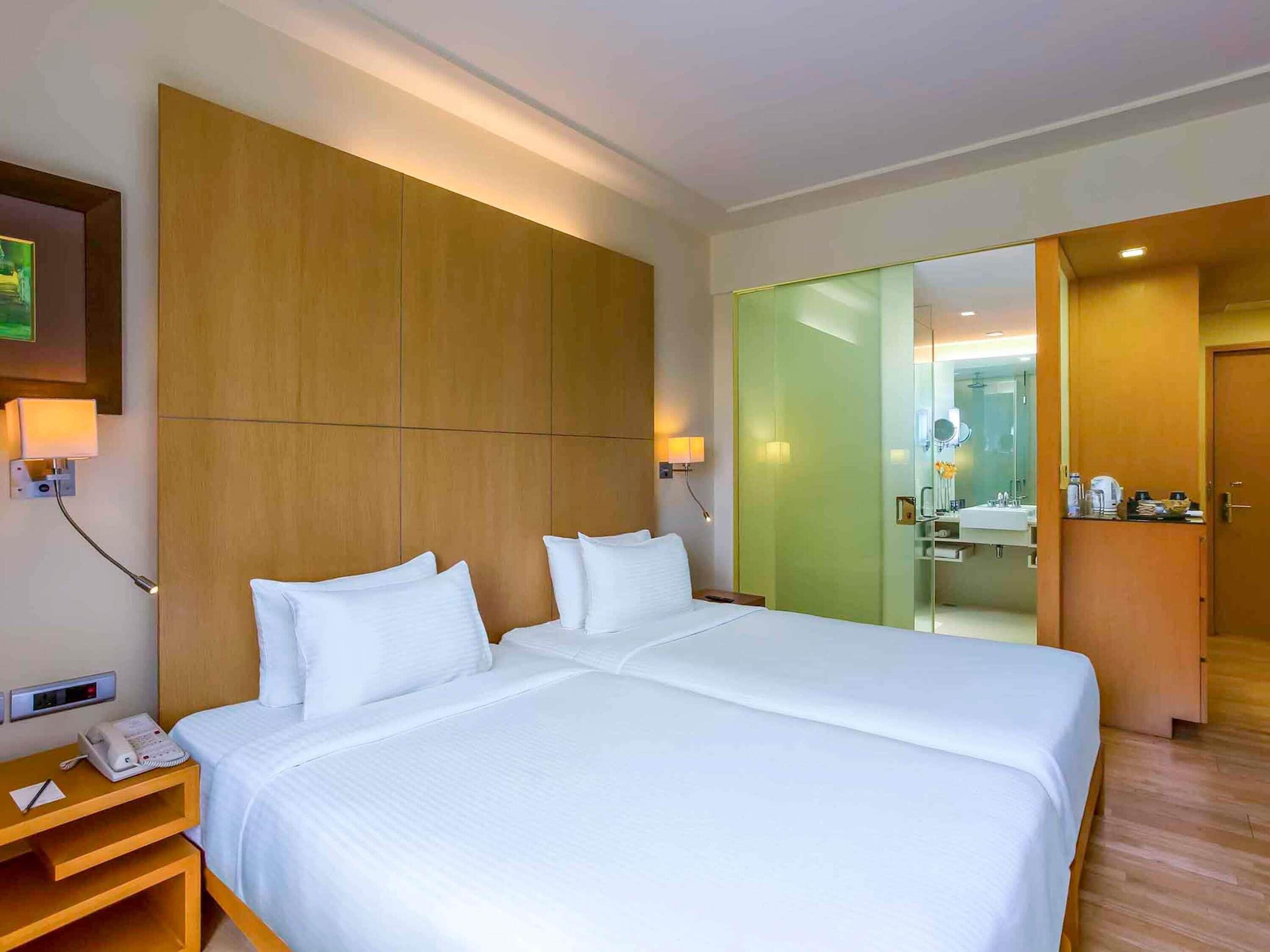 Down duvets, pillow-top beds, minibar, in-room safe