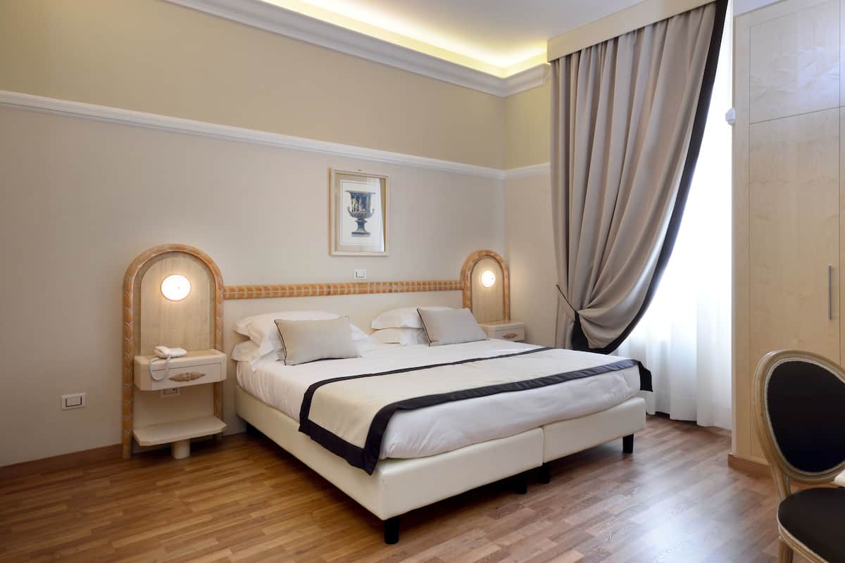Down duvets, minibar, in-room safe, desk