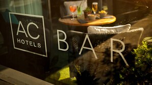 A hotel bar with a sign reading "AC HOTELS" and "BAR". - AC Hotel by Marriott, Manchester Salford Quays (Salford)