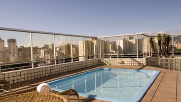 Outdoor pool, pool umbrellas, pool loungers