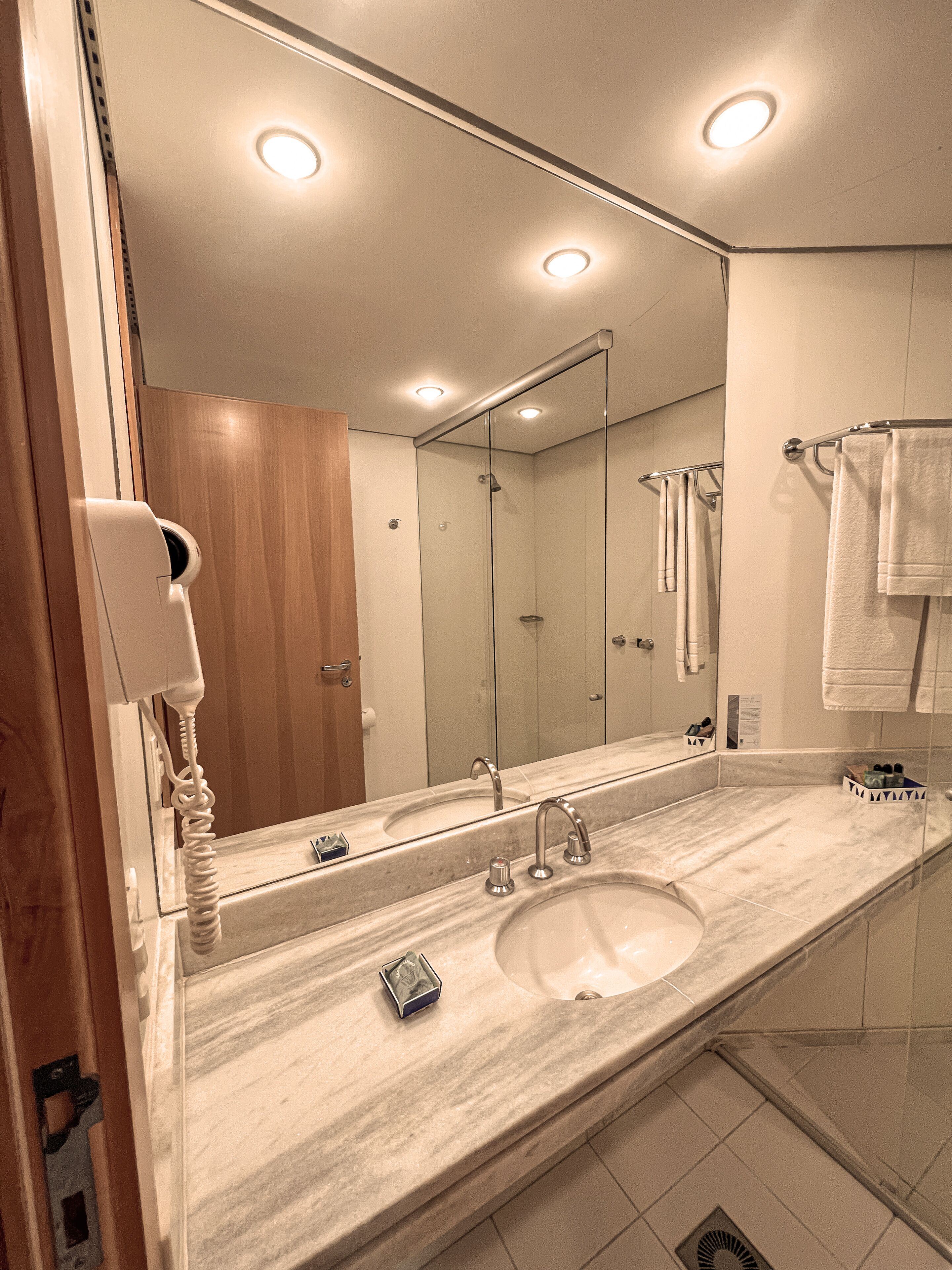 shower, free toiletries, hair dryer, towels