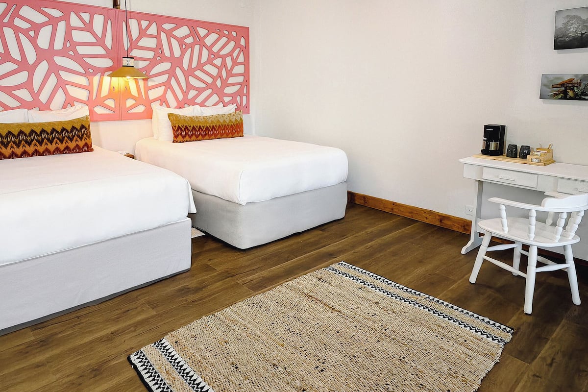 Euphonia Deluxe Suites | Premium bedding, down duvets, Select Comfort beds, in-room safe