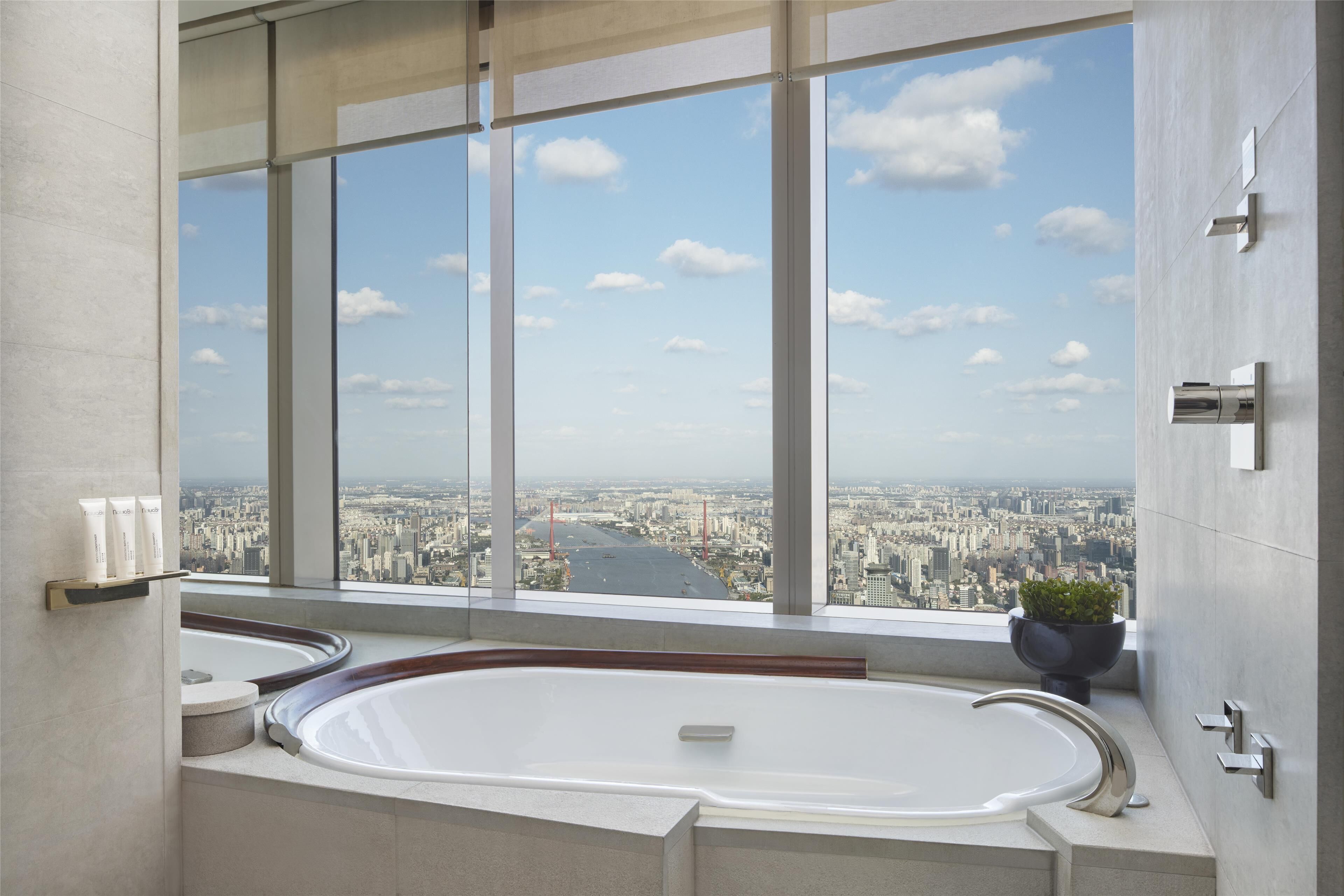 2 twin beds with river view deluxe | bathroom | separate bathtub and shower, deep-soaking bathtub, rainfall showerhead