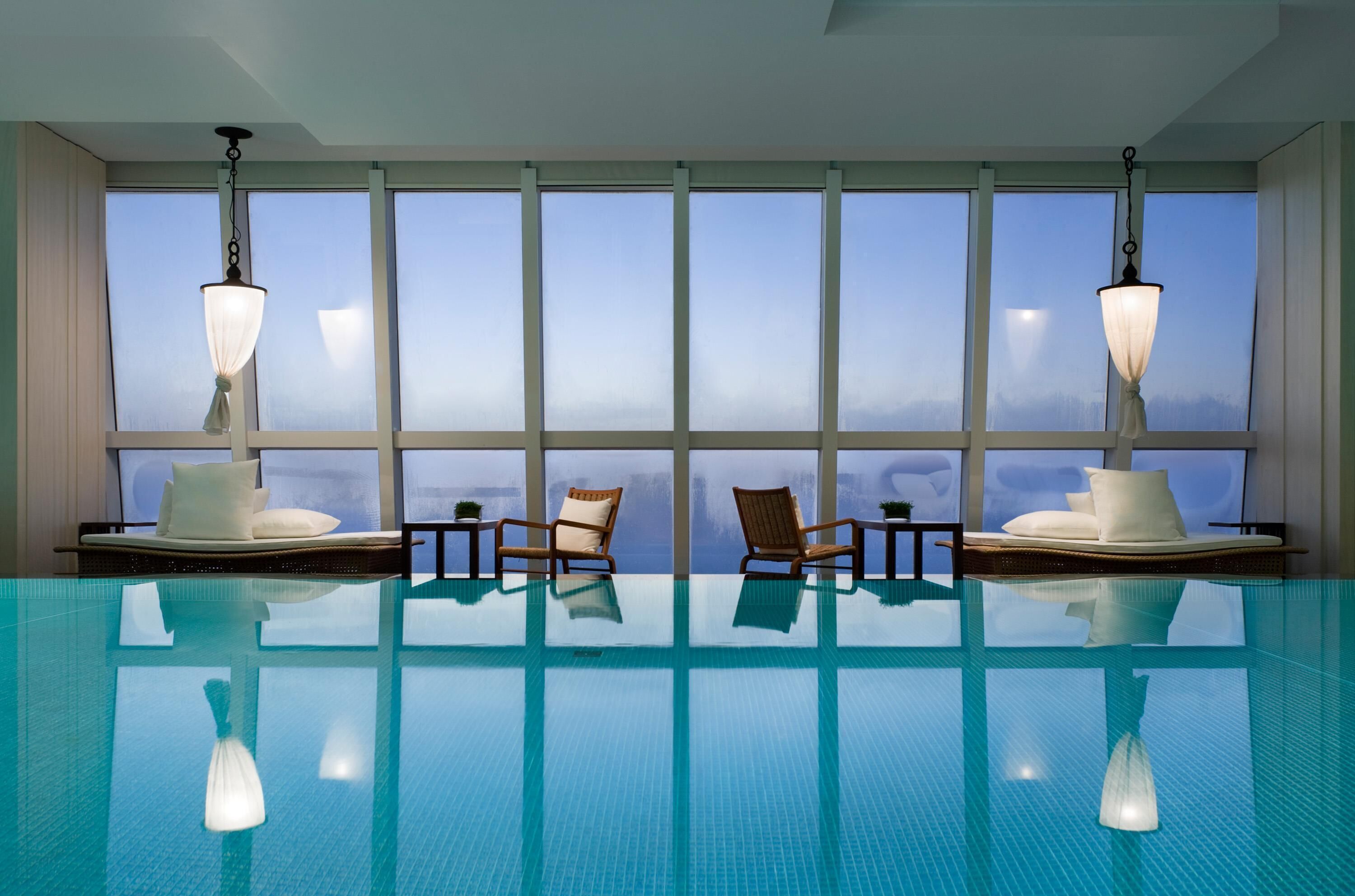 Indoor pool, open 7:30 AM to 10:00 PM, sun loungers, lifeguards on site