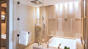Separate tub and shower, deep soaking tub, designer toiletries