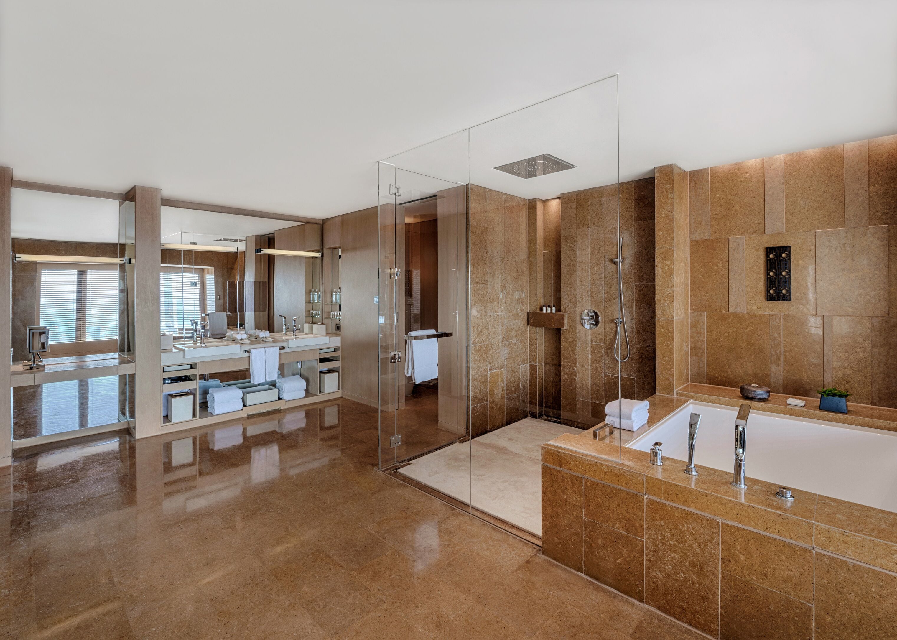 Separate tub and shower, deep soaking tub, designer toiletries