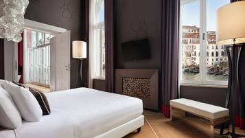 Luxe beddengoed, een minibar, een kluis op de kamer, een bureau