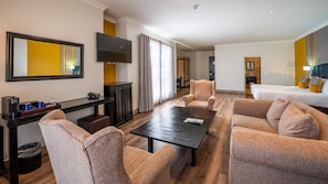 Executive Room | Living area | 43-inch Smart TV with satellite channels