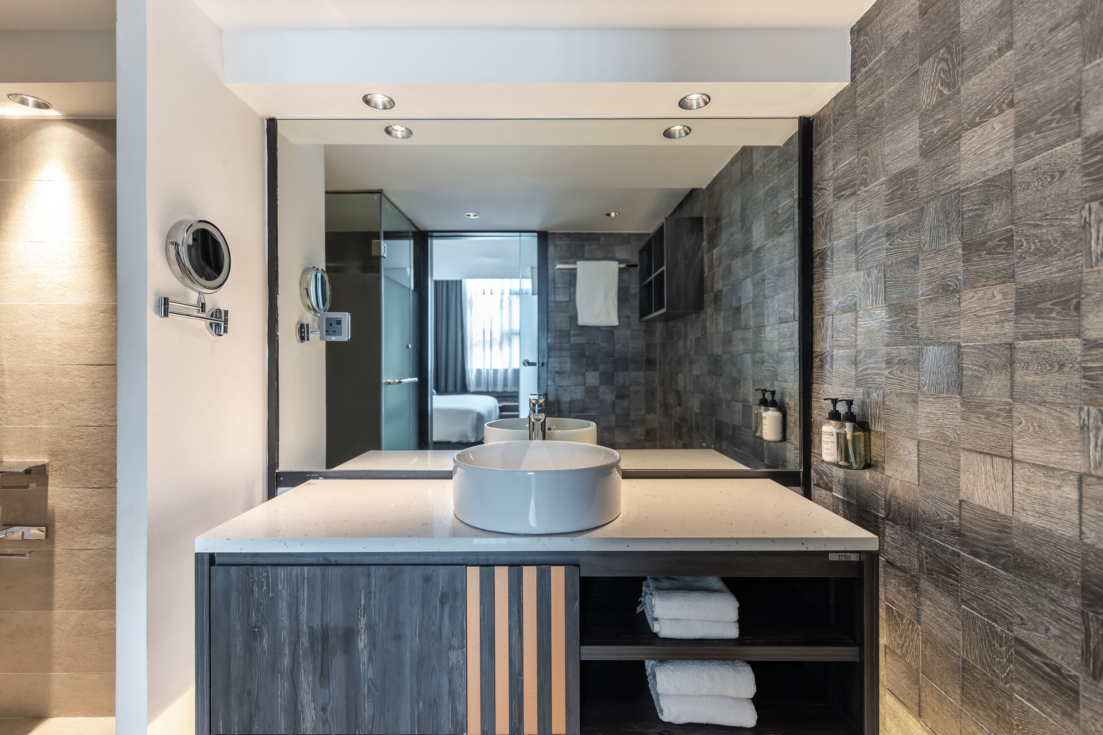 separate bathtub and shower, rainfall showerhead, designer toiletries