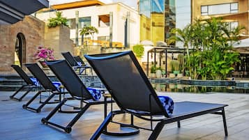 Outdoor pool, open 7:00 AM to 6:00 PM, sun loungers