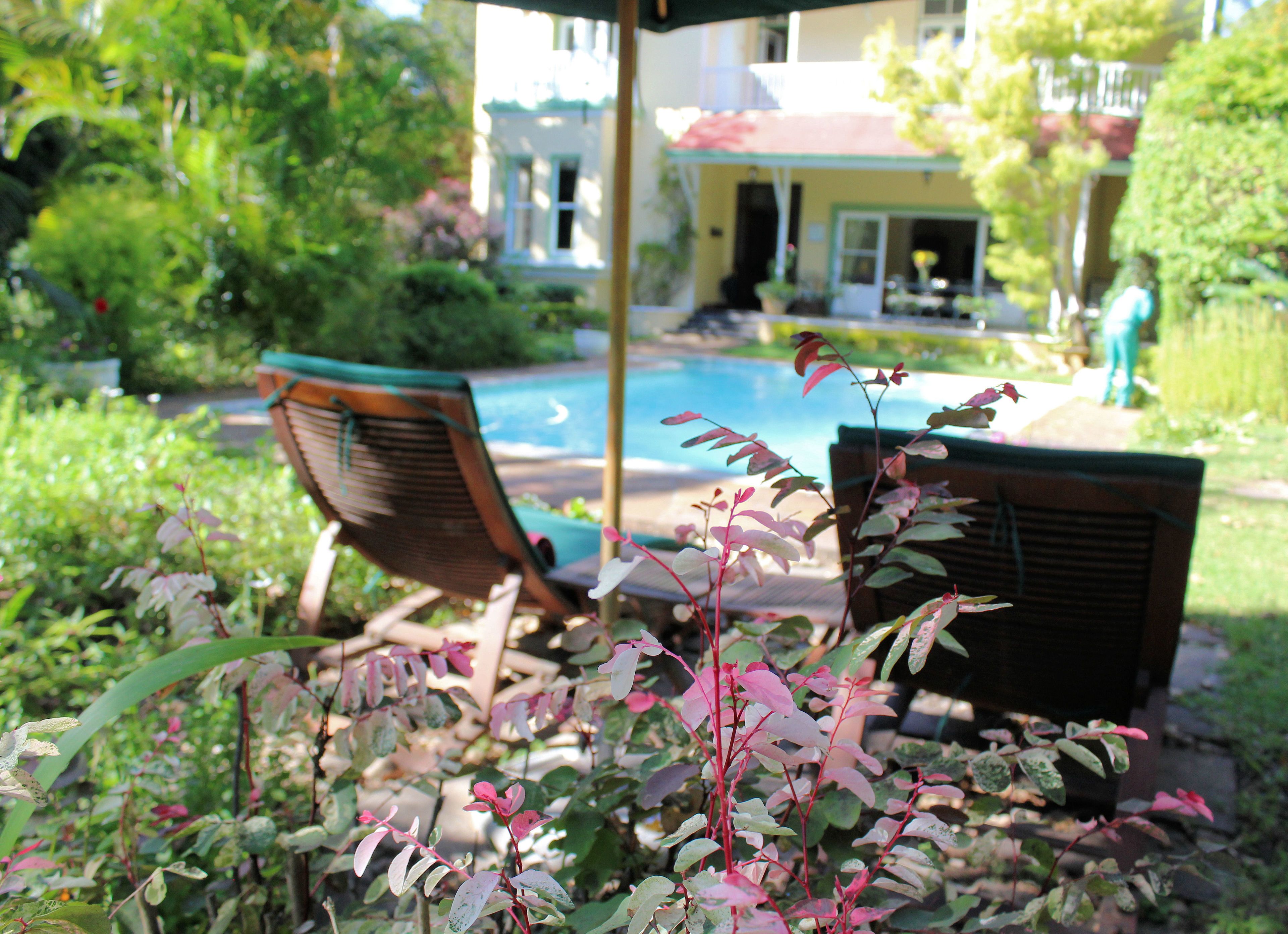 Outdoor pool, open 7:00 AM to 6:00 PM, pool umbrellas, pool loungers