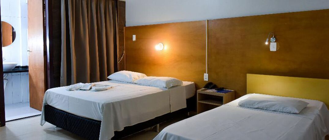 economy double or twin room | pillow-top beds, minibar, in-room safe, individually decorated