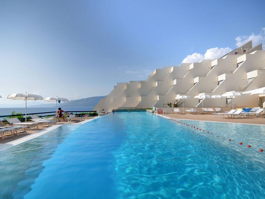 Outdoor pool, pool umbrellas, sun loungers