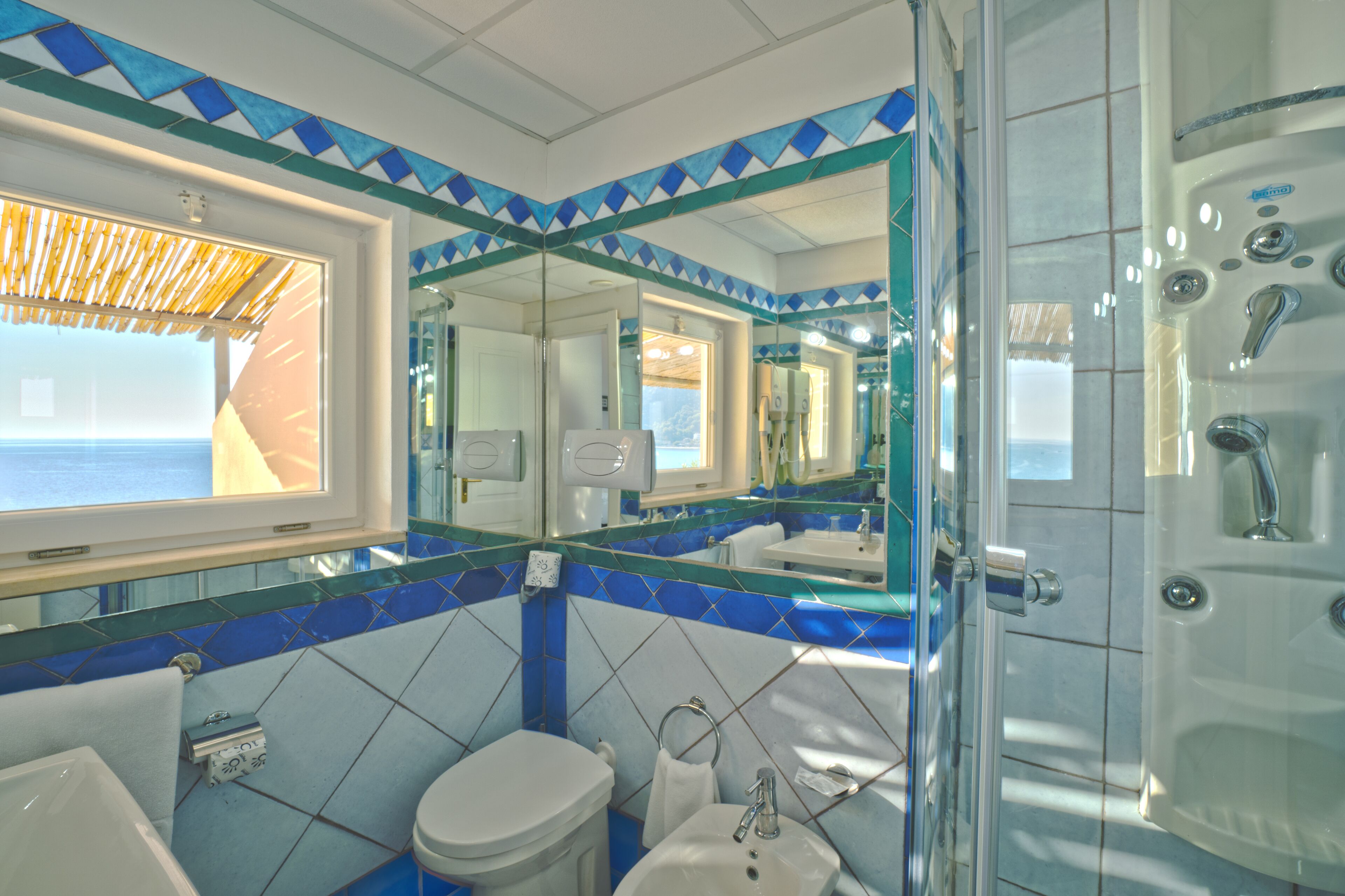 double room, sea view | bathroom | rainfall showerhead, hair dryer, slippers, bidet