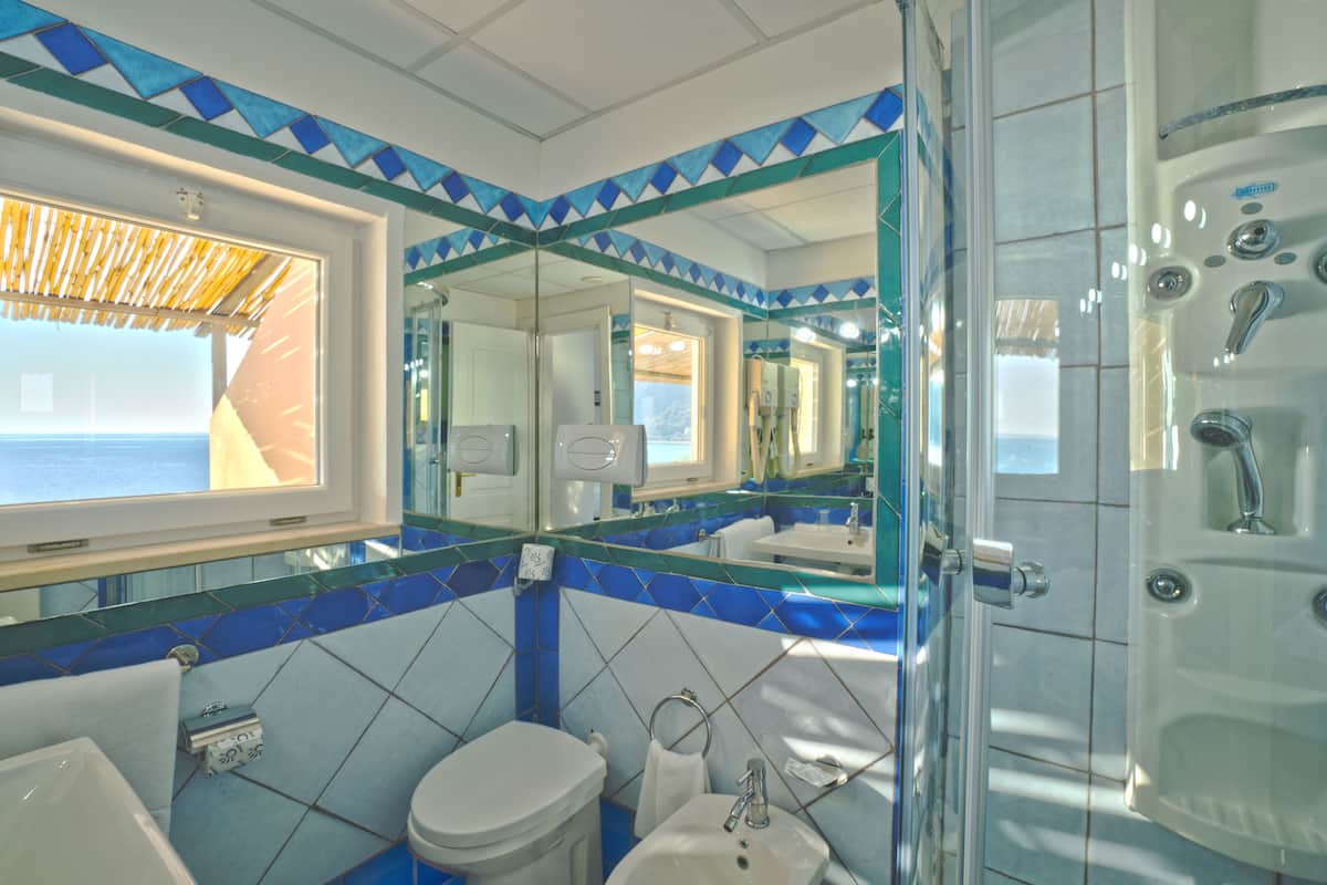 double room, sea view | bathroom | rainfall showerhead, hair dryer, slippers, bidet