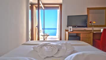 Suíte júnior, vista para o mar | Roupas de cama premium, frigobar, cofres nos quartos