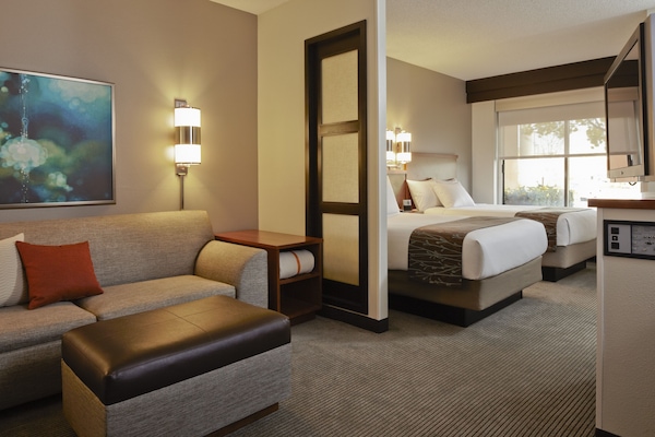 Minibar, desk, blackout curtains, iron/ironing board