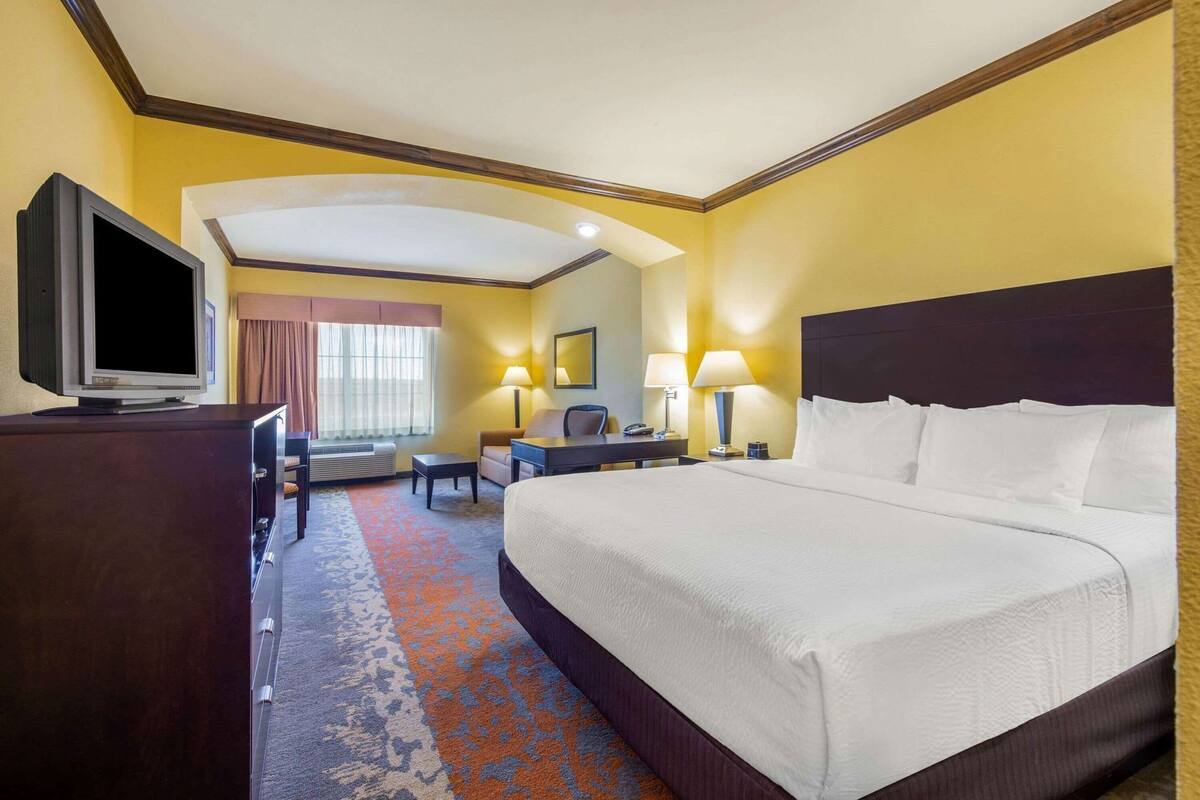 Premium bedding, desk, blackout curtains, iron/ironing board