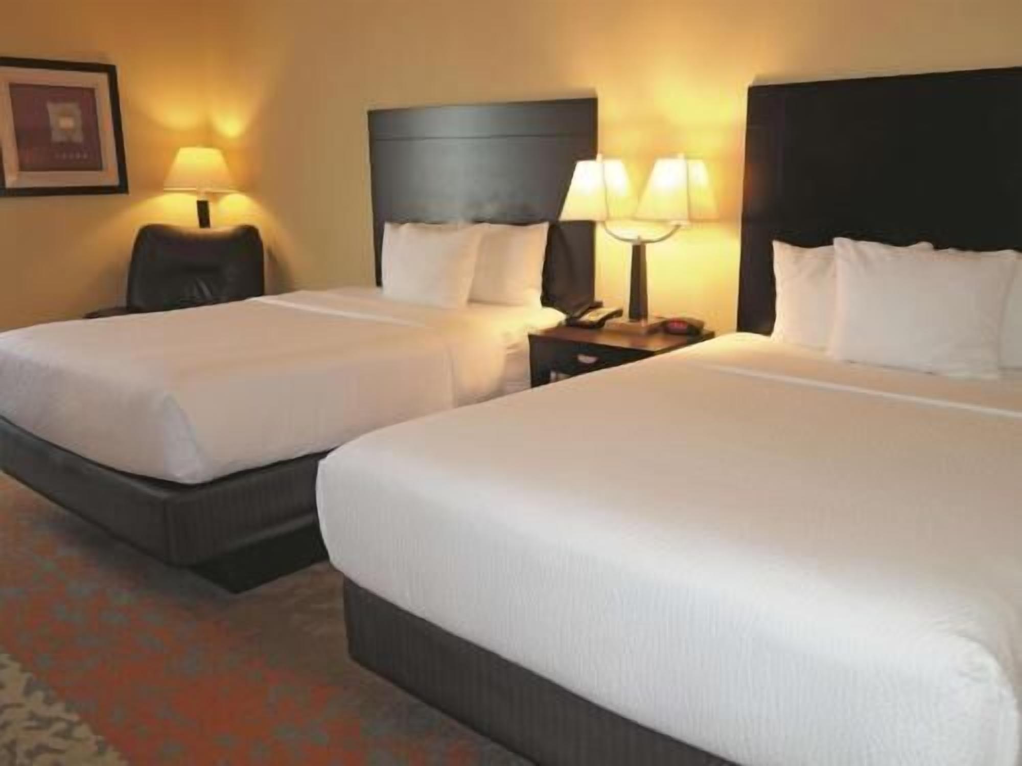 Premium bedding, desk, blackout curtains, iron/ironing board
