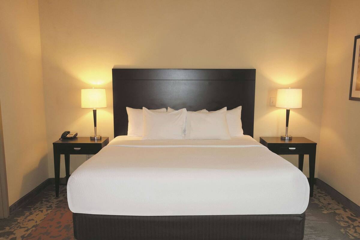 Premium bedding, desk, blackout curtains, iron/ironing board