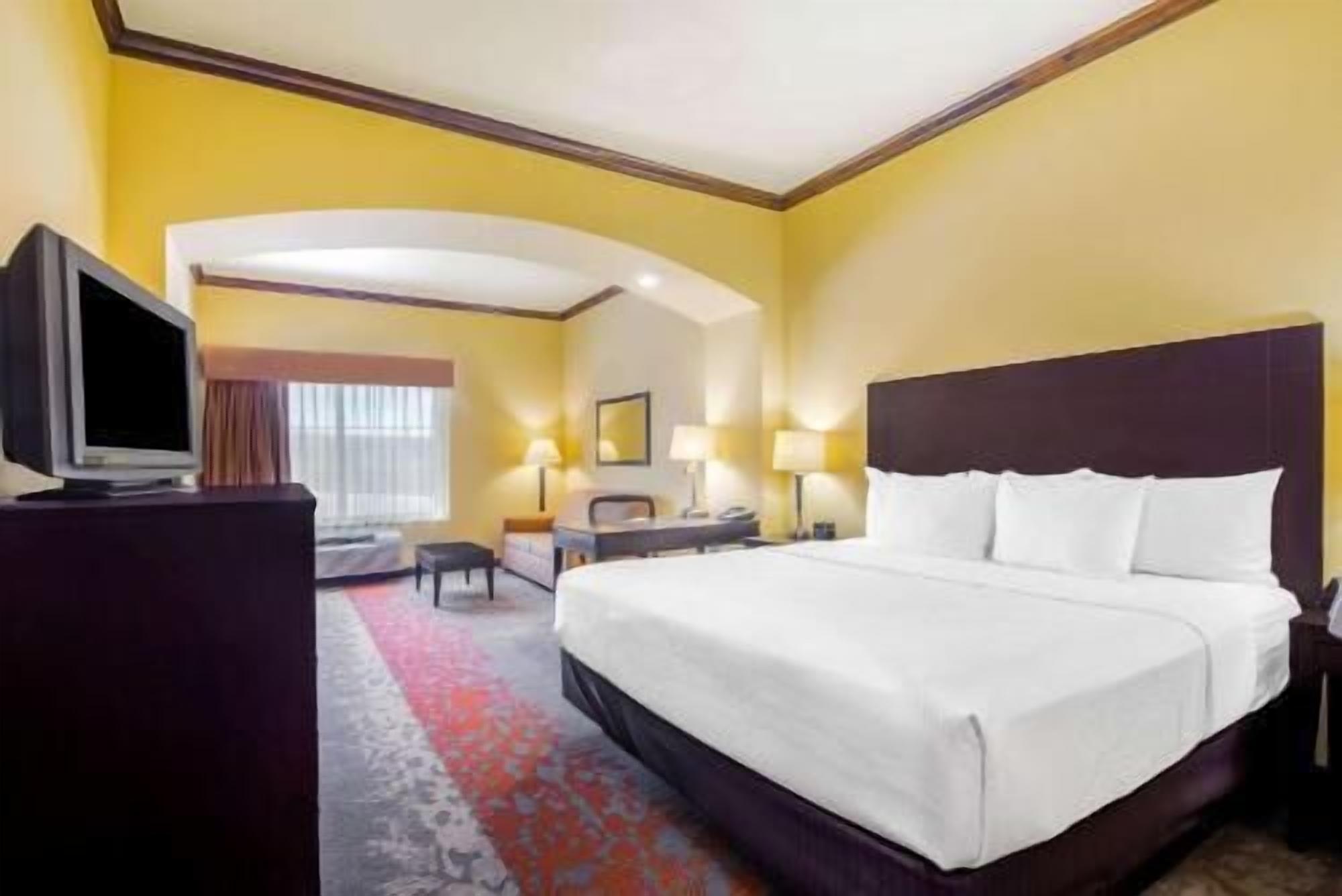 Premium bedding, desk, blackout curtains, iron/ironing board