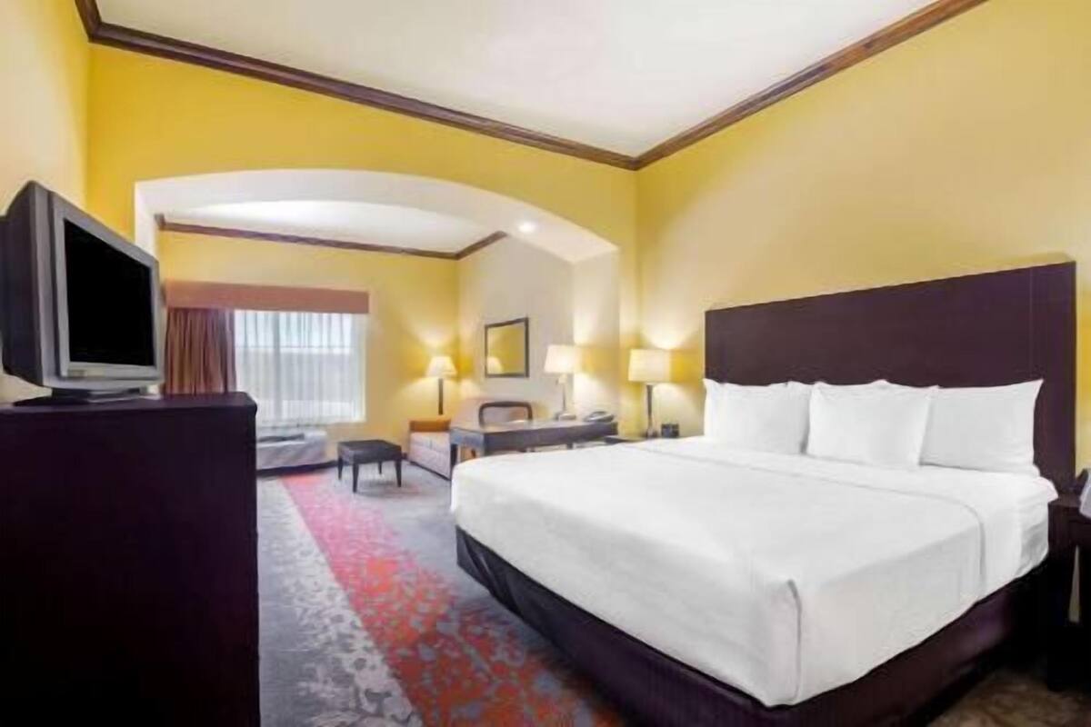 Premium bedding, desk, blackout curtains, iron/ironing board