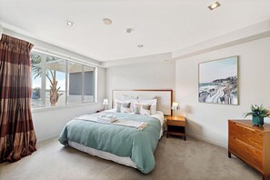 Luxe beddengoed, een kluis op de kamer, een strijkplank/strijkijzer