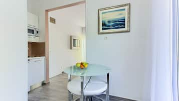 Comfort Studio, Balcony, Garden View | Private kitchen | Fridge, electric kettle, cleaning supplies