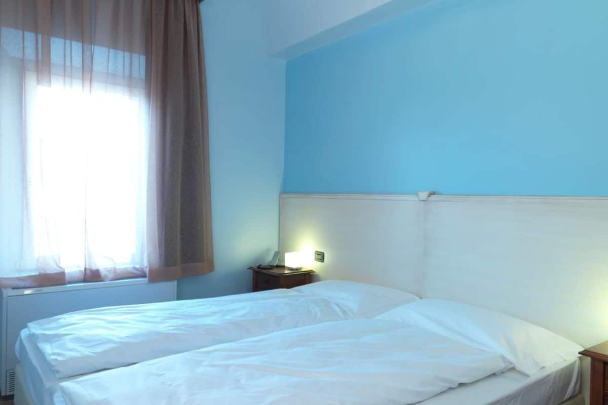 down duvets, memory-foam beds, in-room safe, desk