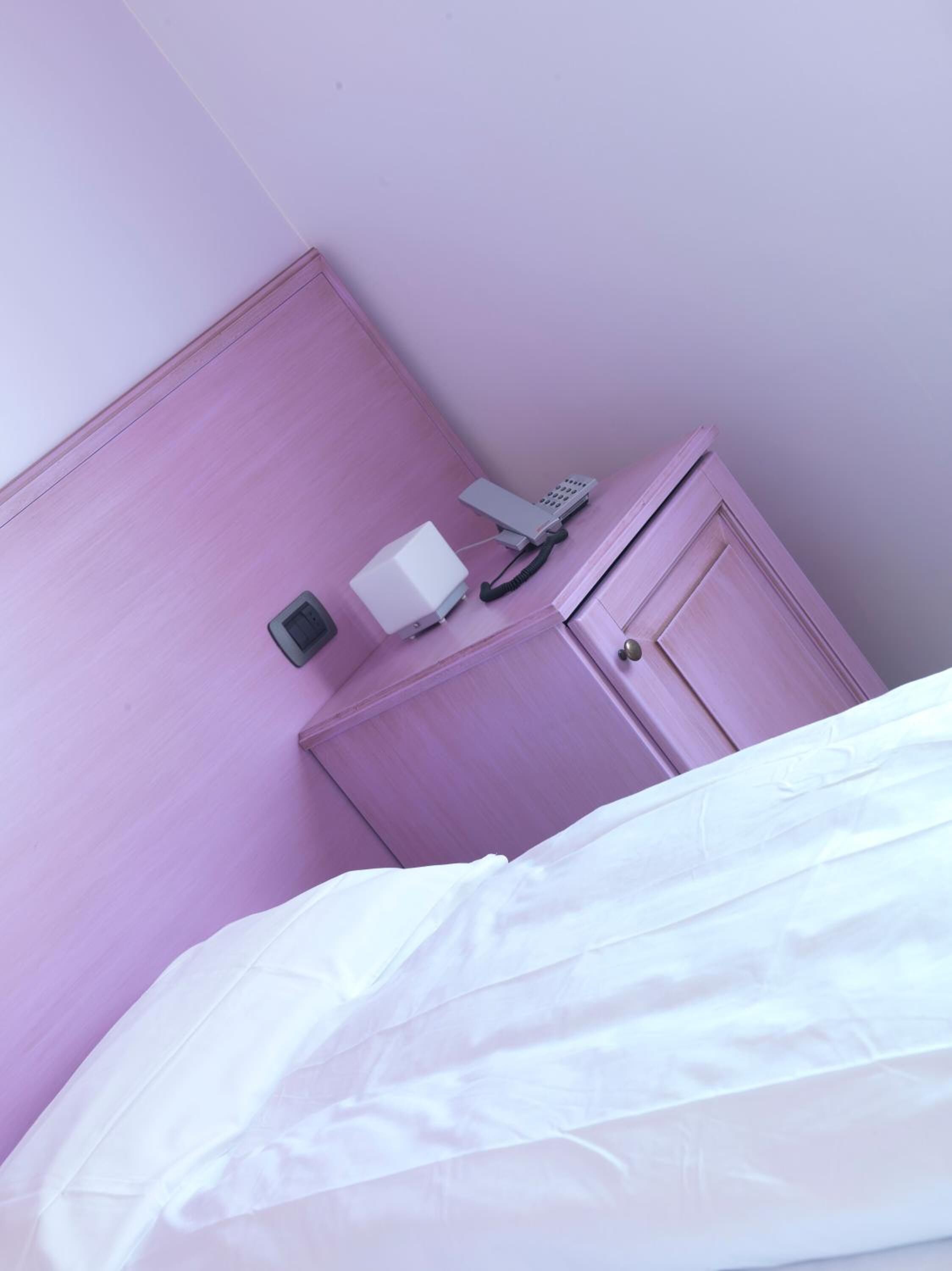 down duvets, memory-foam beds, in-room safe, desk