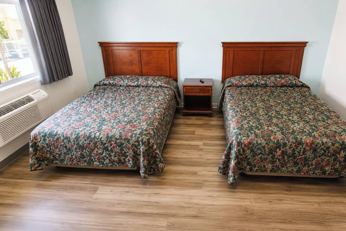 Room, 2 Queen Beds, Non Smoking | Desk, iron/ironing board (on request), WiFi (free), alarm clocks